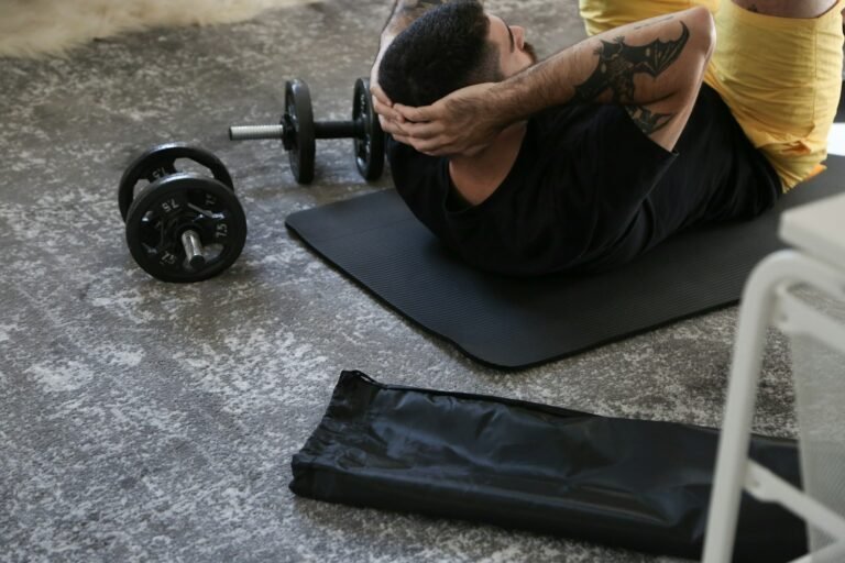 Athlete working through a floor-based recovery session