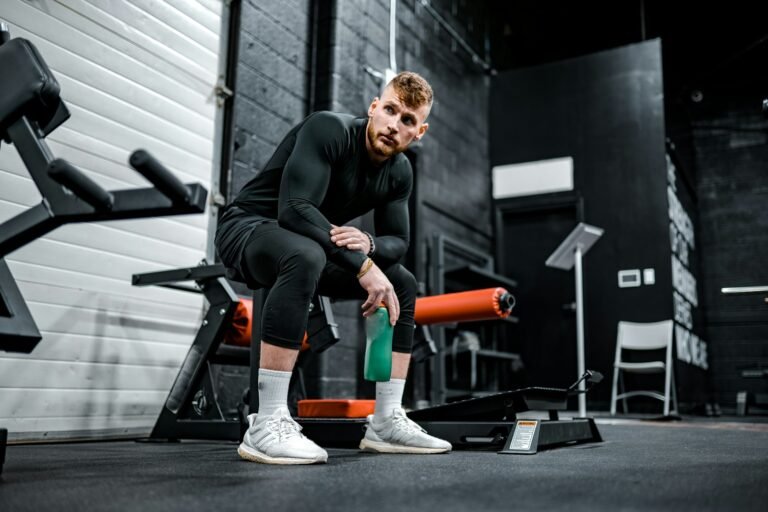 Athlete managing post-workout muscle soreness