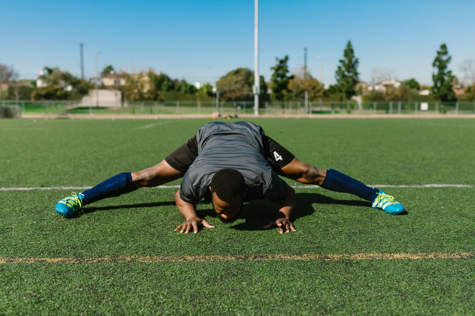 Athlete stretching before a strength workout