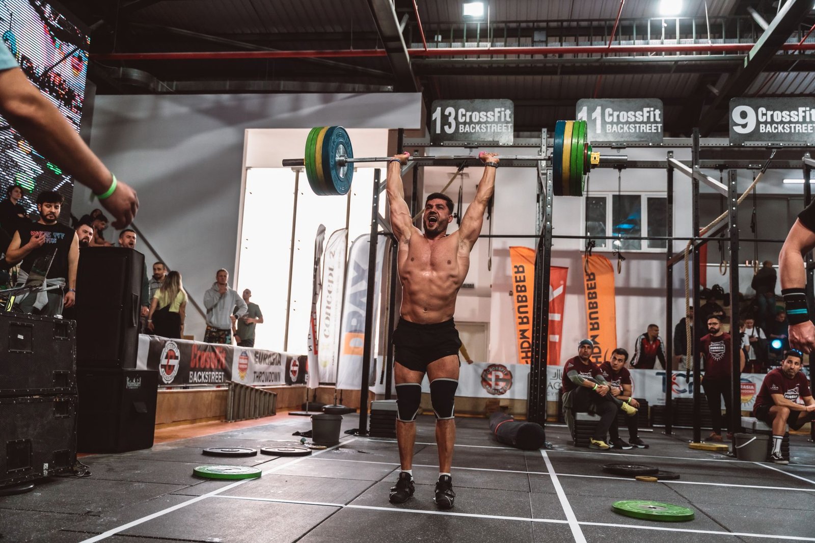 Athlete working through a deep squat mobility position