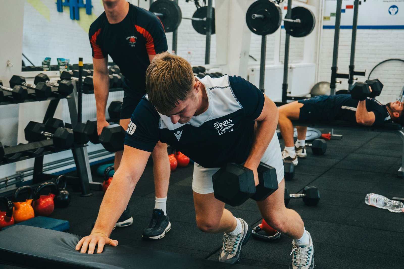 Athlete practicing a controlled squat for hip mobility