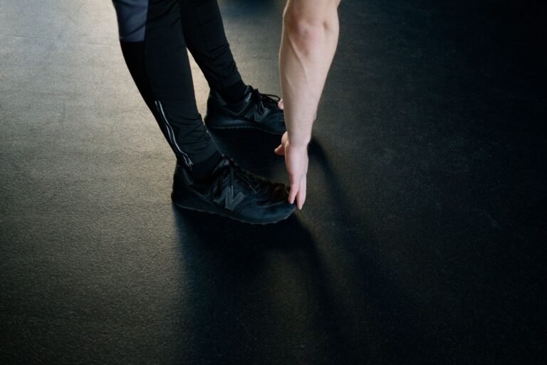 Athlete performing a static stretch before training